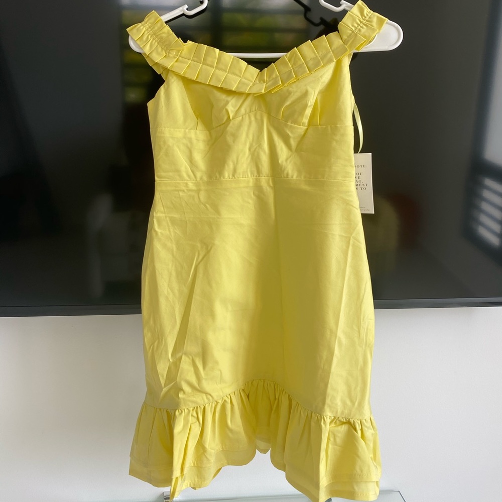 Feel feminine & cute in this yellow mini dress